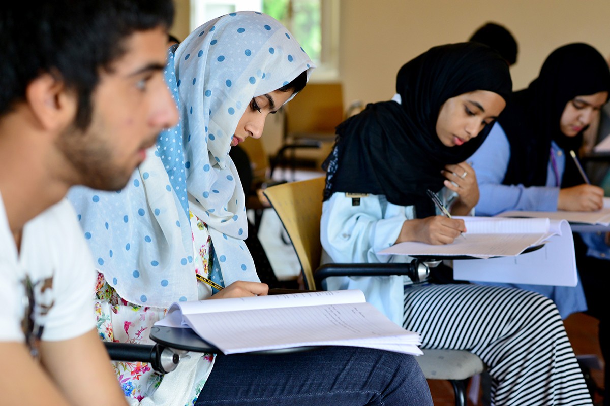 Arab teacher with student