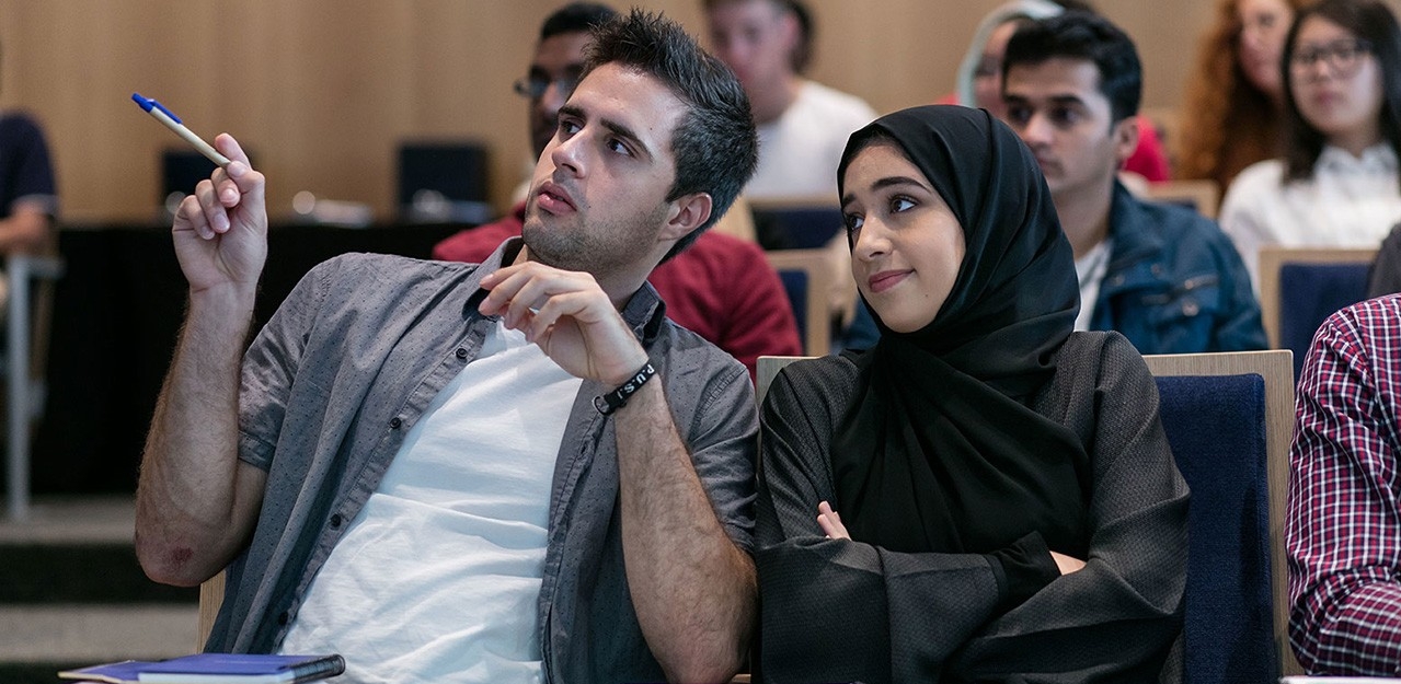 NYU Abu Dhabi students in a lecture hall. 
