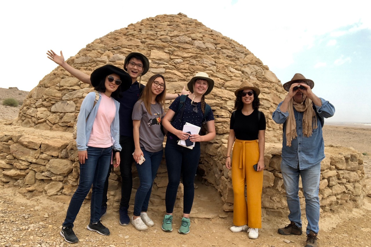 Students explore Jebel Hafeet Beehive Tombs in Abu Dhabi with  professor Robert Parthesius for World Heritage and Universal Collection class (photo: 2018).