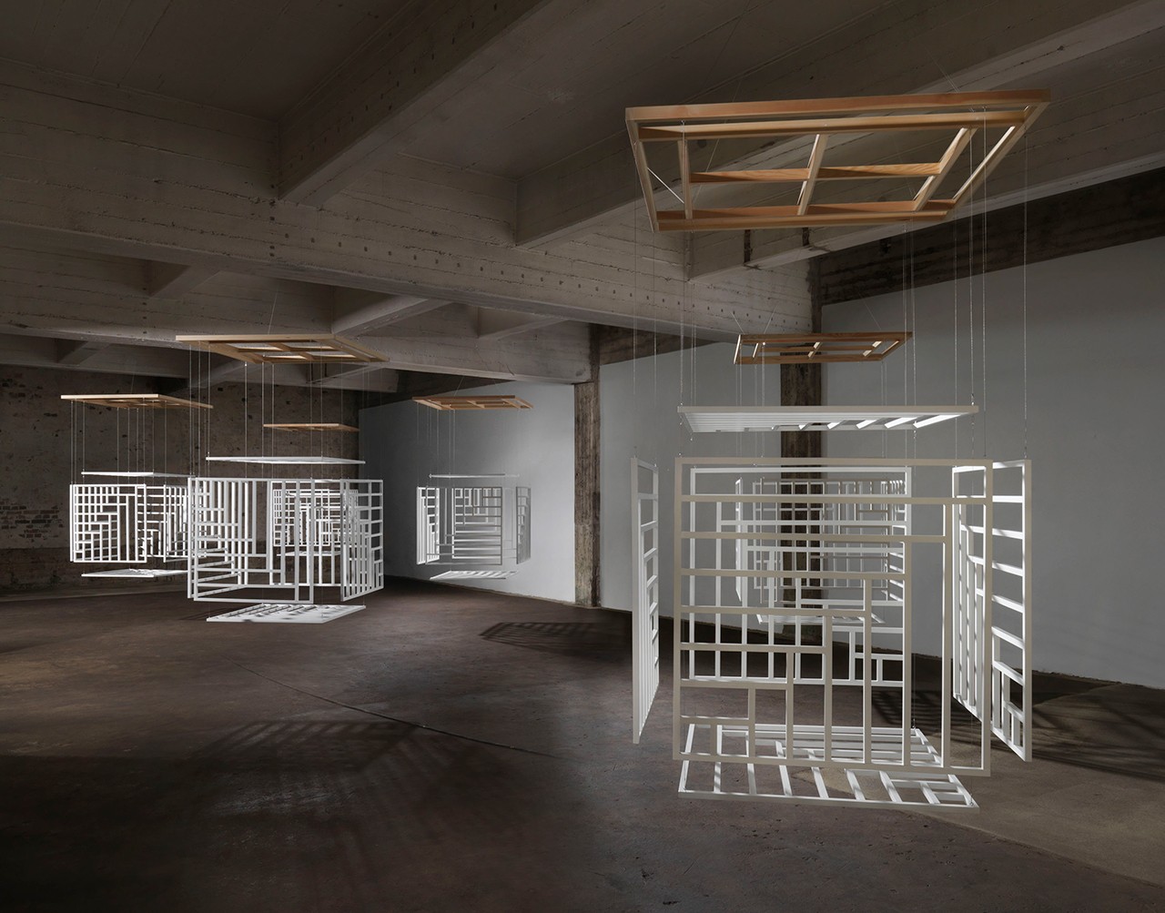 Title of Installation: Webbing Material: 6 cubes (beech wood), paint, wire, suspended on frames (fir) from the ceiling Dimensions: 140 x 140 cm; Hight in relation to space Exhibition: In situ: A Sequence of Works Berlin Tegel June 1 – 30, 2016