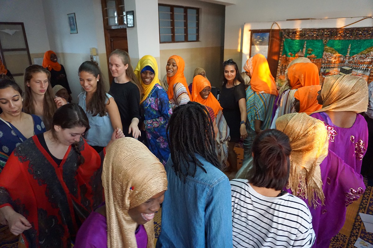 Regional seminar Fall 16NYUAD students participating in a Swahili women's dance during a private concert by female taarab group Tausi in Zanzibar.