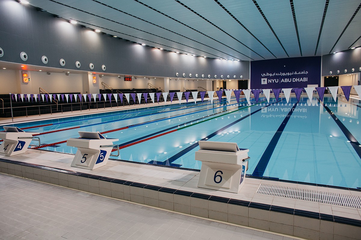 NYUAD's 50-meter indoor competition pool has a movable bulkhead and accommodates eight lanes.
