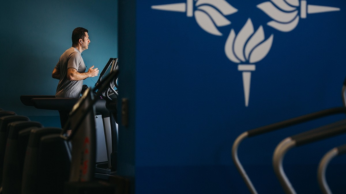 A runner using the treadmill in the Fitness Center.