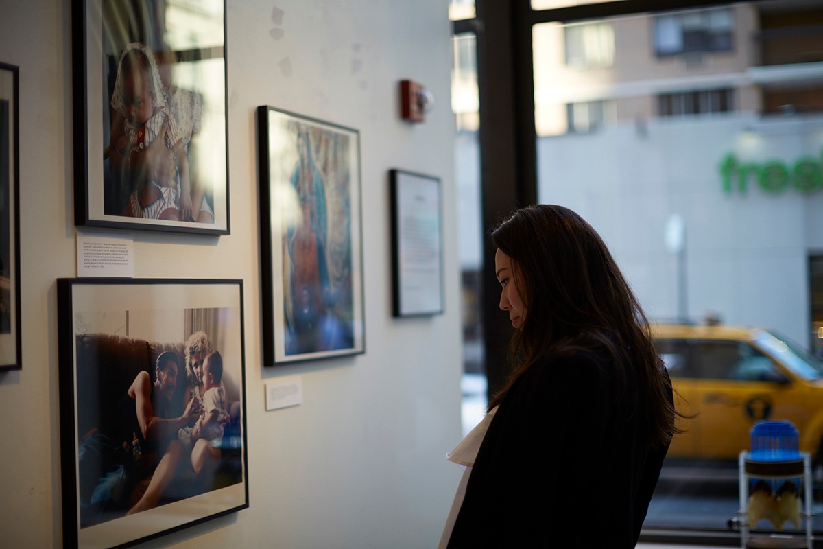 Sophie Arni looks at artwork during her internship at Christie's in New York City.