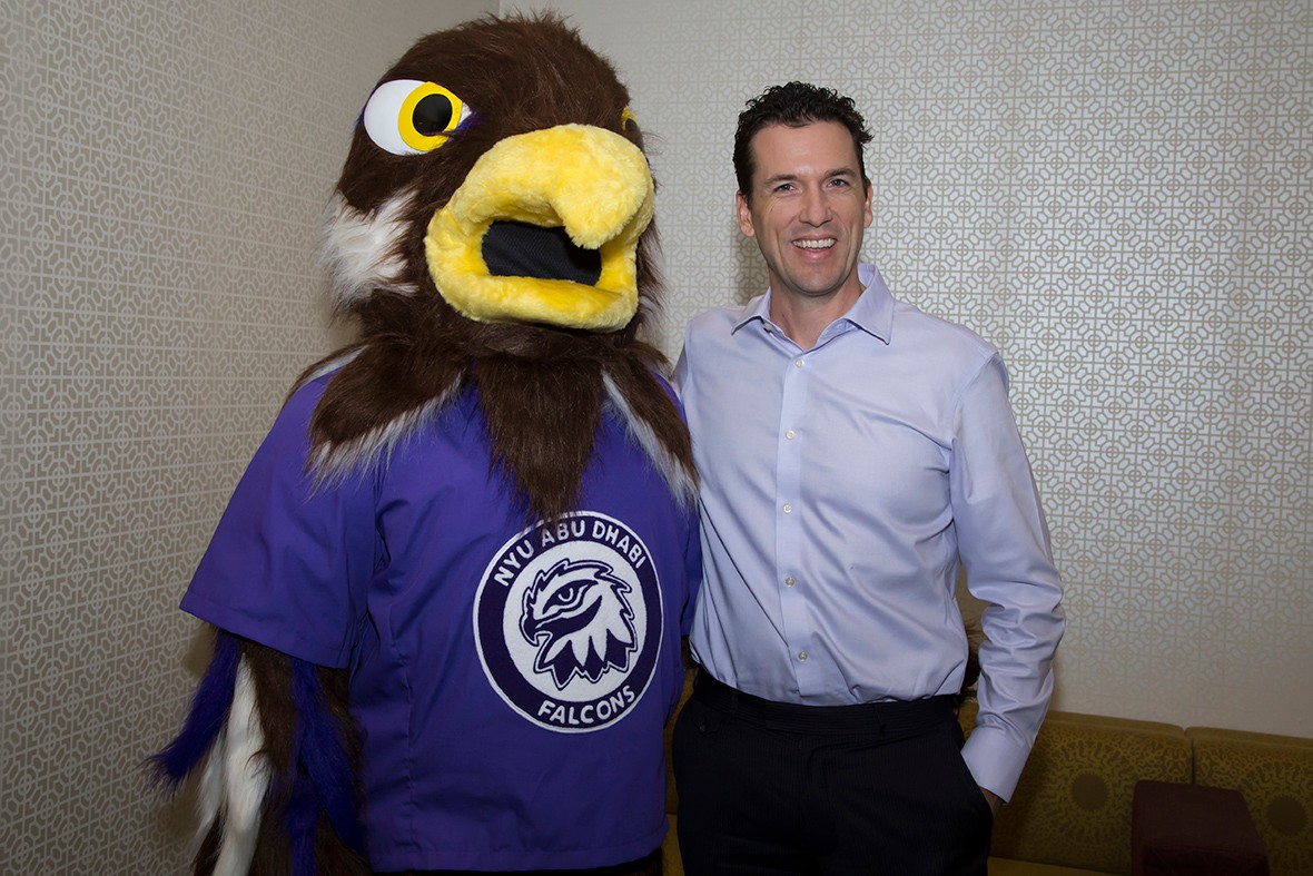 NYUAD's new Falcon mascot meets with Associate Vice Chancellor for Student Affairs and Dean of Students Kyle Farley.