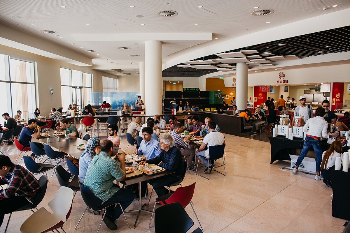 Students dining in the Campus East Restaurant (D2).