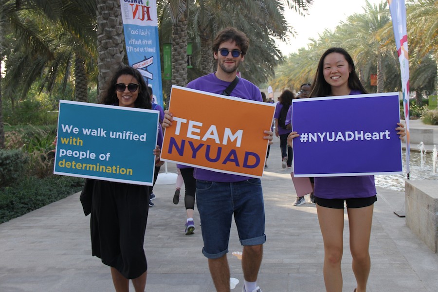 NYUAD community members participate in the Walk Unified event to mark the Special Olympics and show support for people of determination.