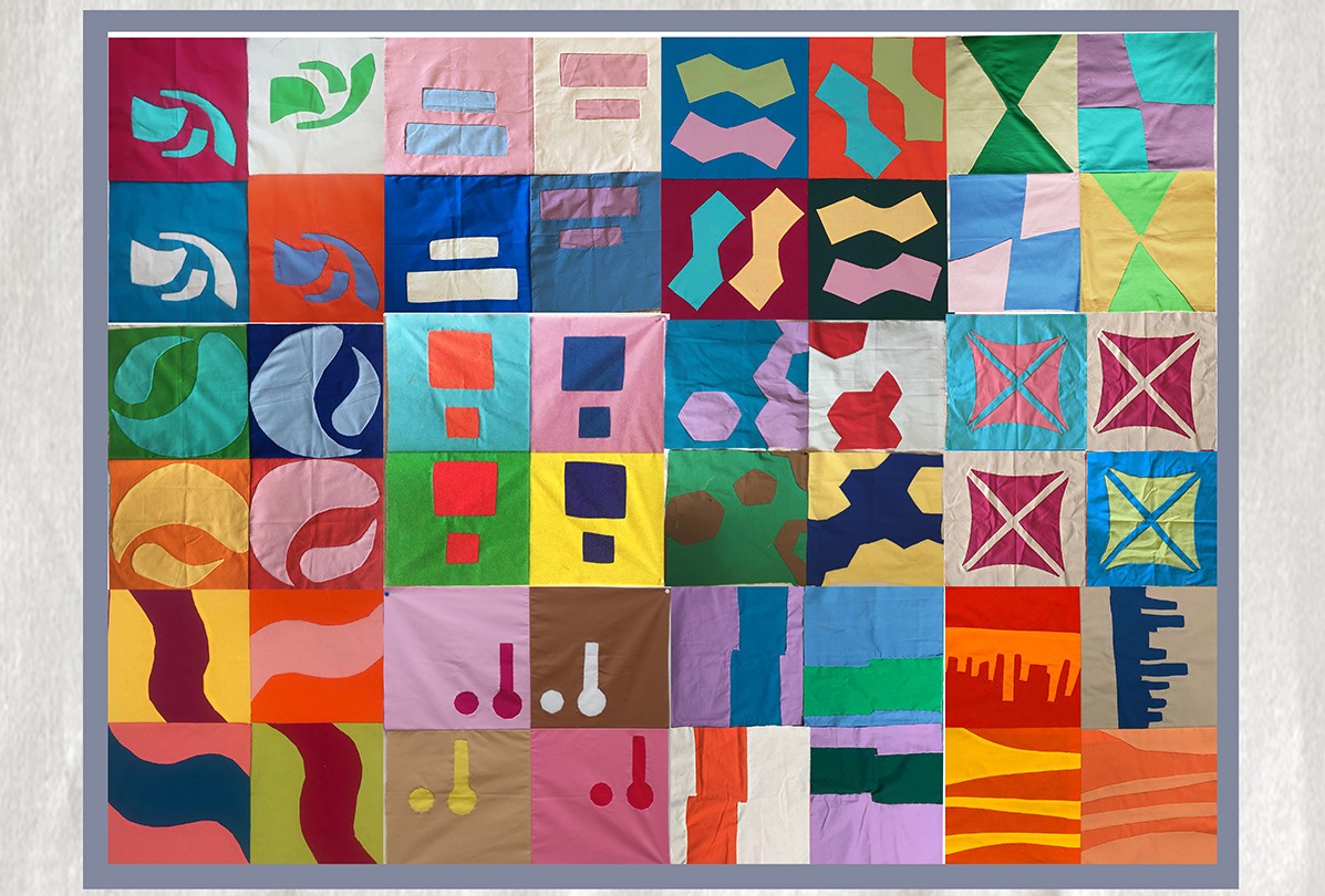 The compiled image of all the appliques inspired by architecture arranged in a quilt pattern.  