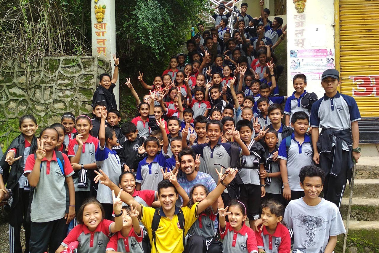 Chandan Mishra with Bloom Nepal School's students 