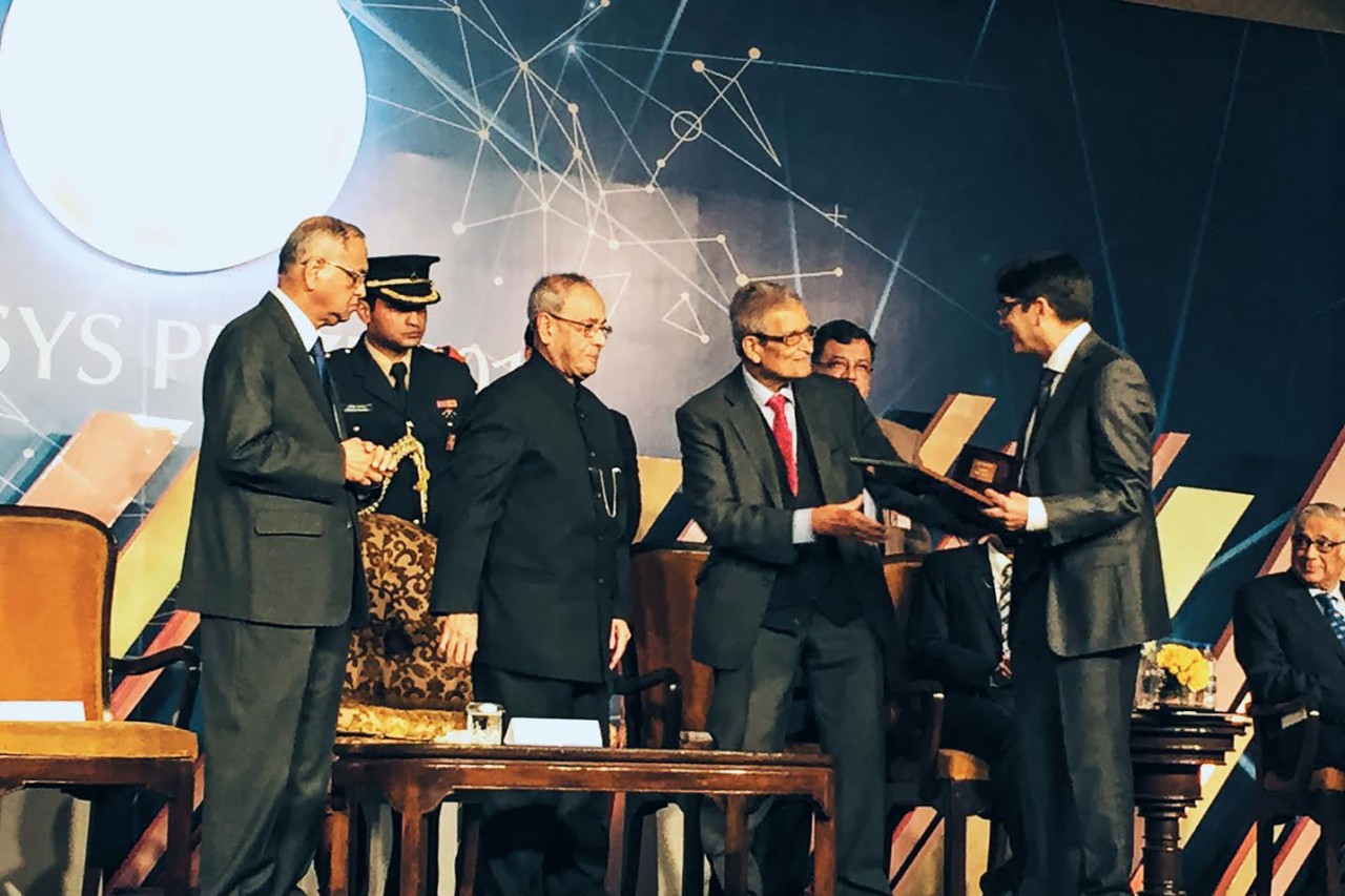 NYUAD philosophy professor Jonathan Ganeri accepts the Infosys Prize at a ceremony in India.