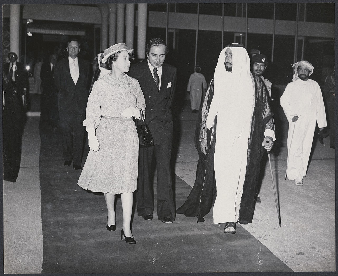 Sheikh Zayed walking with Queen Elizabeth and Zaki Nusseibeh, 1979. Copyright Zaki Nusseibeh, courtesy of Akkasah Center for Photography. AD_MC_020_ref66