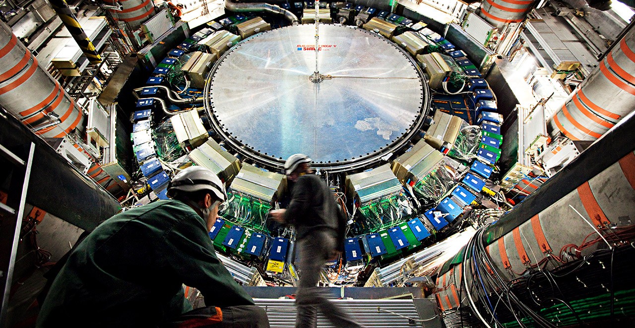 Engineers working on the large hadron collider for the Atlas project. 