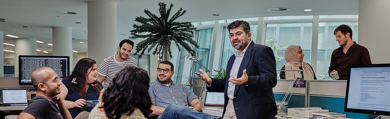 Nizar Habash, associate professor of Computer Science, third from right, with fellow researchers.